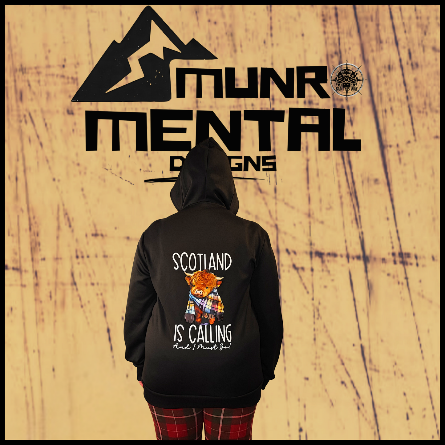 Munro Mental hoodie Scotland Is Calling worn by model with hood up back view
