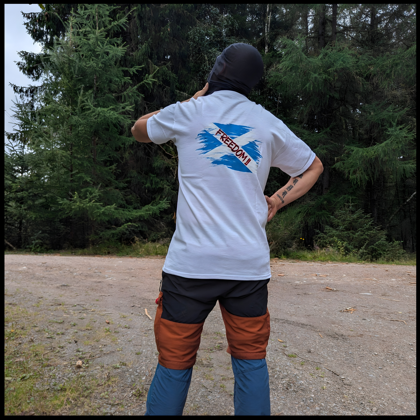 Battle of Stirling Bridge t-shirt worn in forest setting back view
