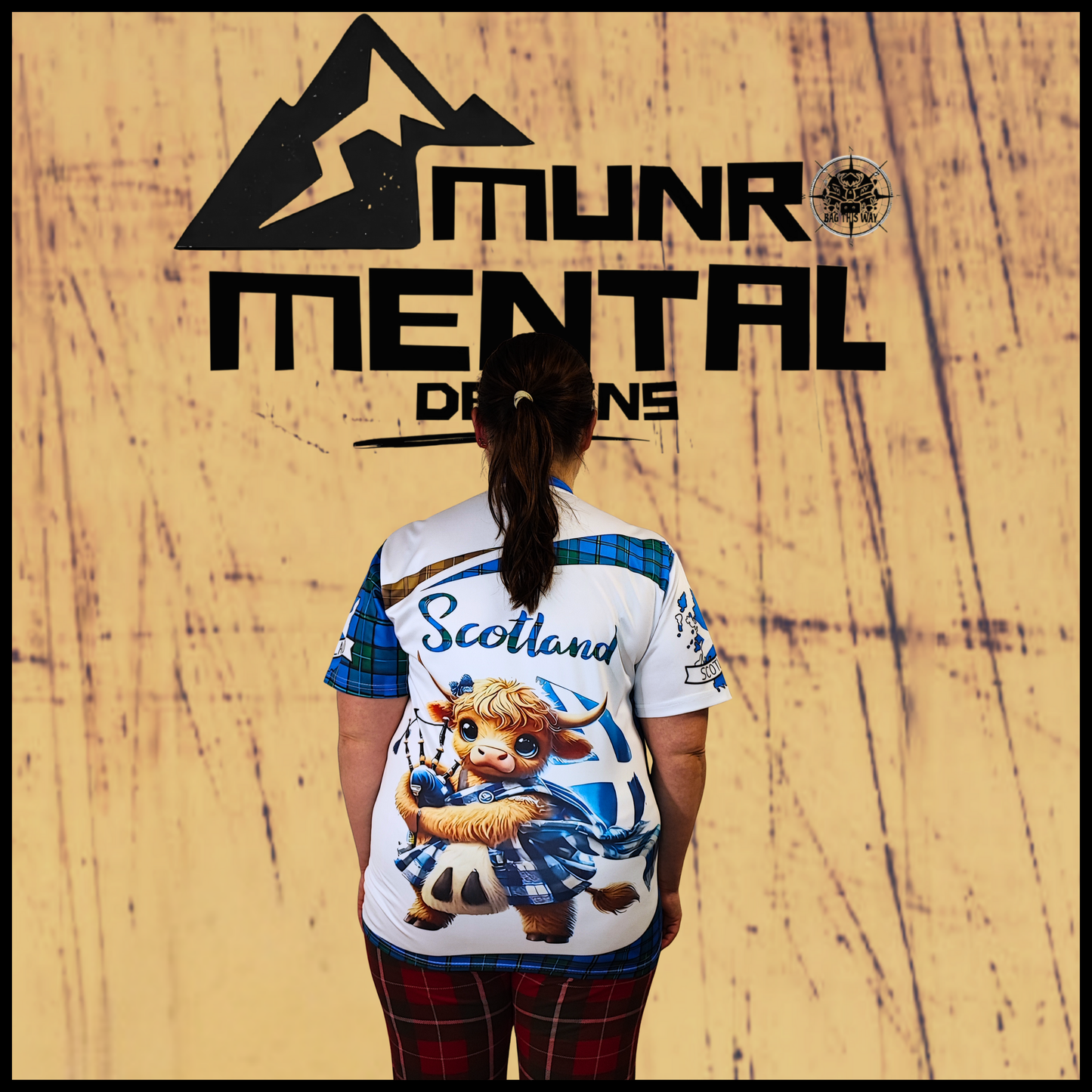 Munro Mental “Highland Coo Scotland” t-shirt – model back view
