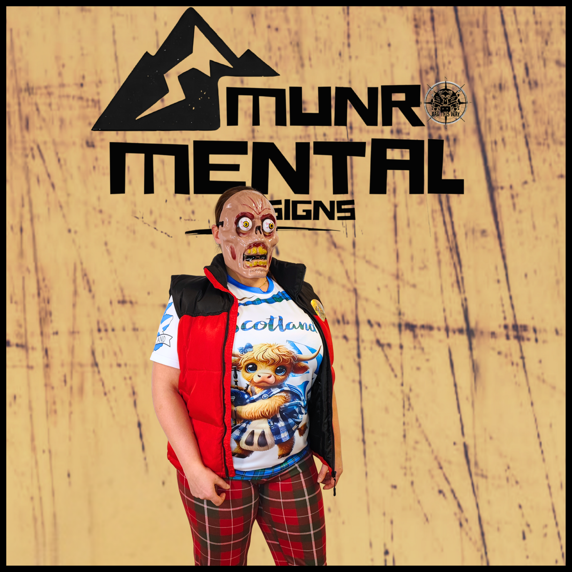 Munro Mental “Highland Coo Scotland” t-shirt – model left view
