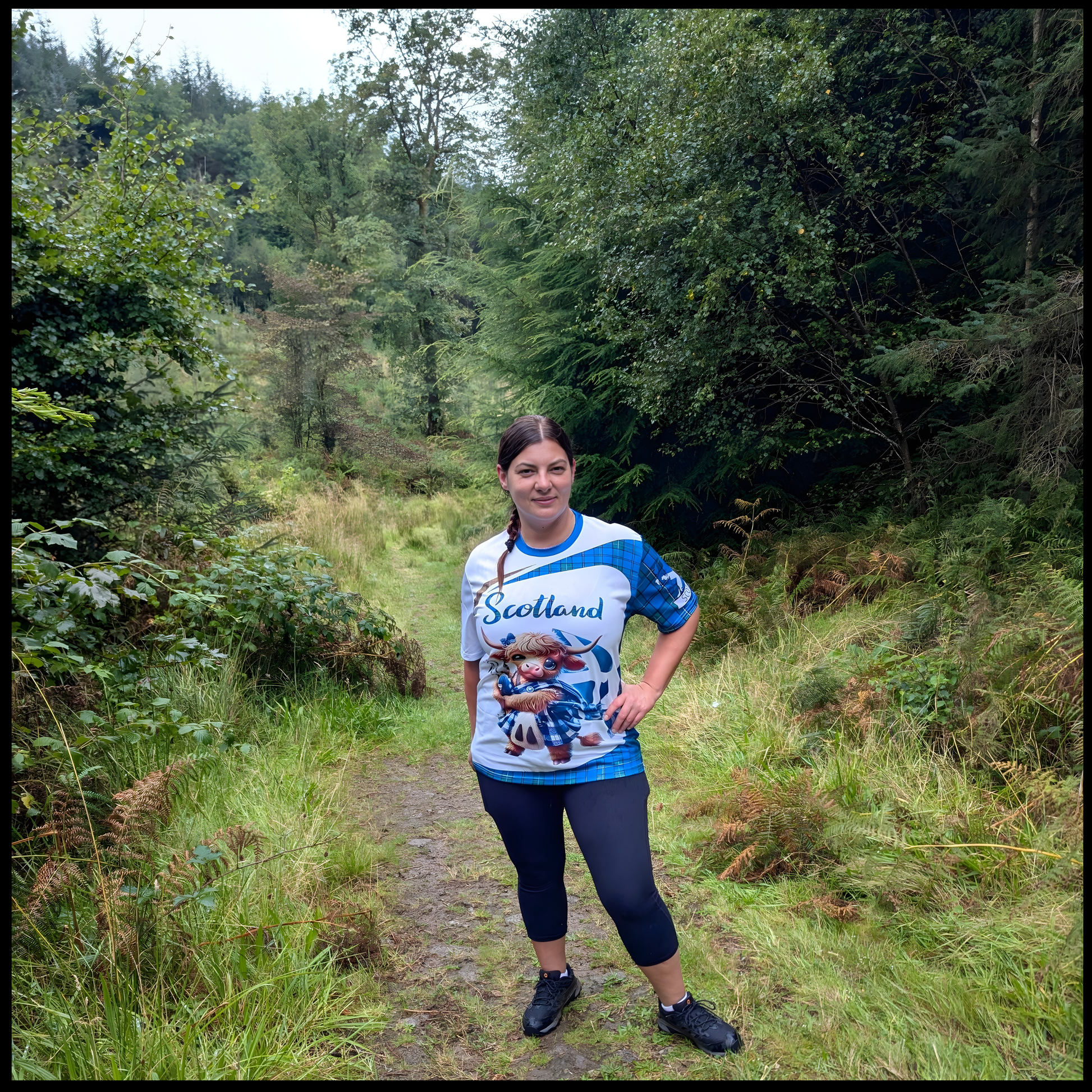 Munro Mental “Highland Coo Scotland” t-shirt –  outdoor, model front view