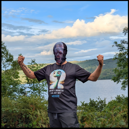 Munro Mental “Not a Loch Ness Monster” t-shirt – model wearing t-shirt at Loch Ness
