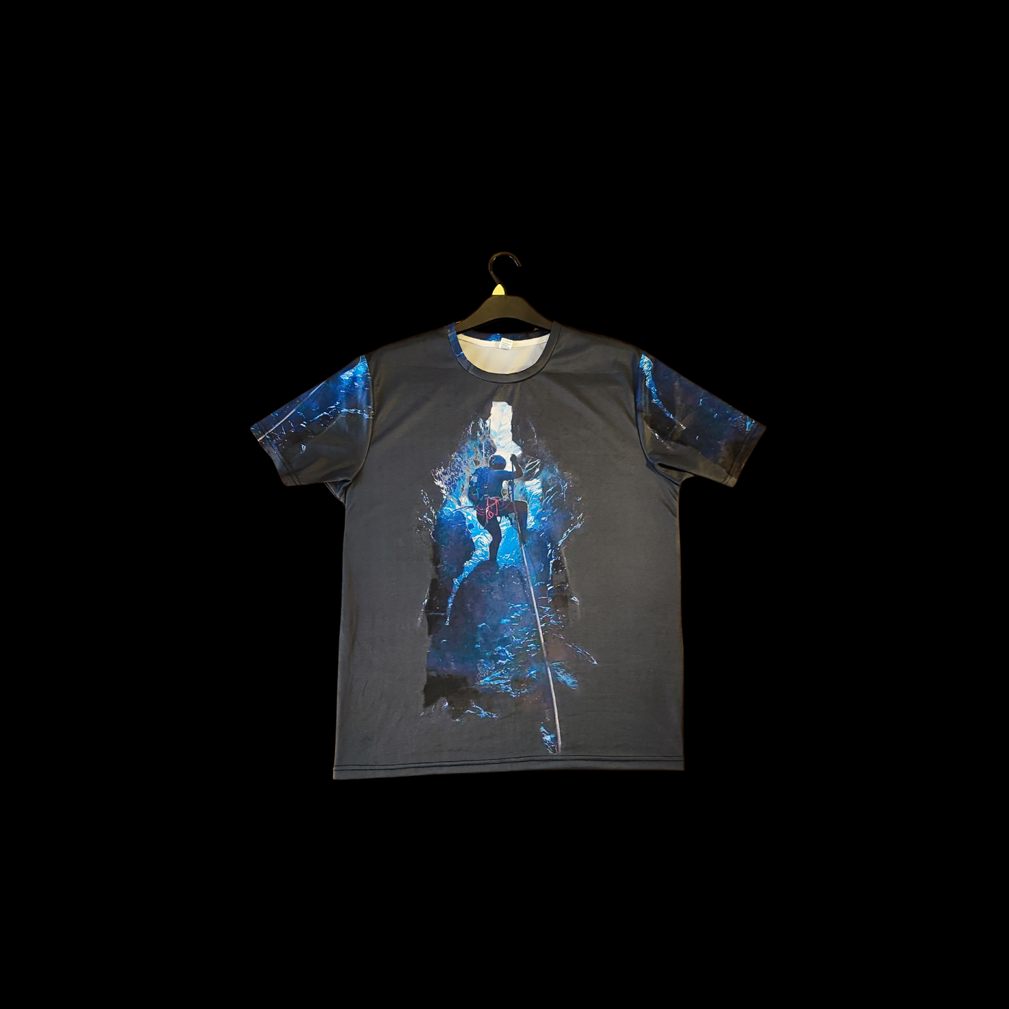 Munro Mental Tshirt The Cave front detail showing deep cave exploration artwork
